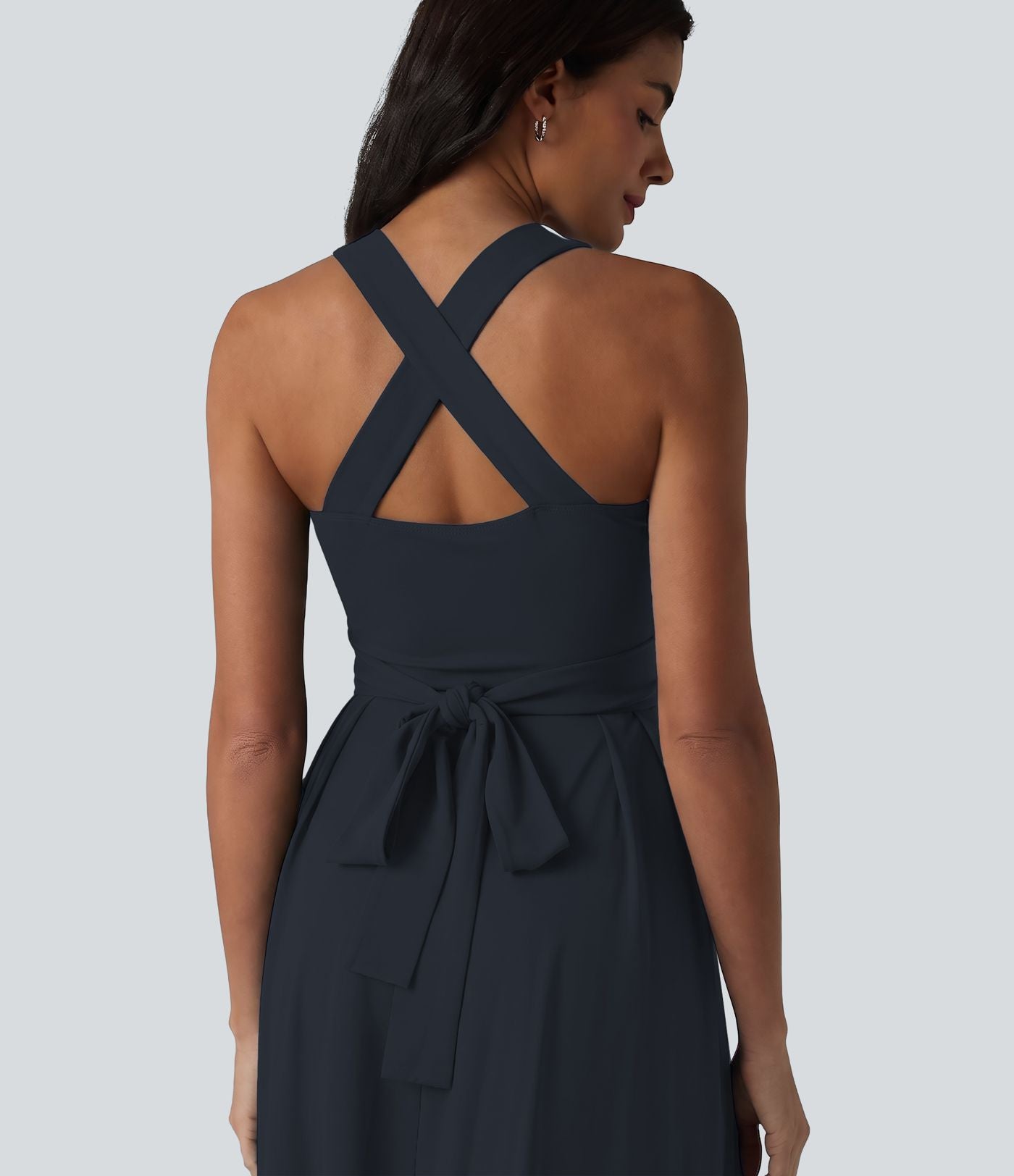 Robe midi fluide sans manches décolleté cœur avec bretelles croisées, nœud dans le dos et poches