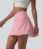 Jupe de tennis mini 2 en 1 à rayures, taille haute croisée, ourlet arrondi et poches