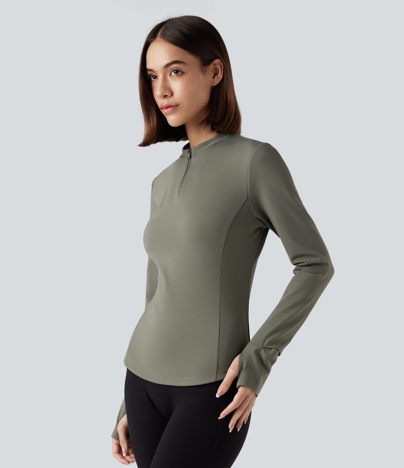 Haut de sport yoga polaire col montant demi-zip à manches longues avec passants pouces