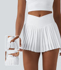 Breezeful™ Jupe-short tennis mini 2-en-1 plissée séchage rapide taille haute croisée avec poches