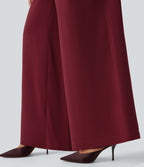 Combinaison pantalon de soirée large à décolleté en V, manches longues bouffantes, ceinture et poches