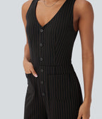 Combinaison tailleur rayée à jambes larges, décolleté en V, découpe et poches
