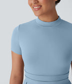 Robe longue décontractée à col montant, manches courtes et poches latérales