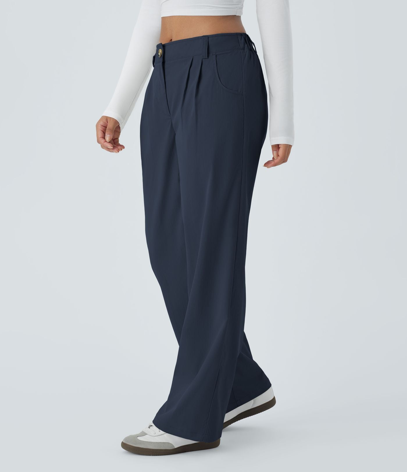 Pantalon décontracté droit taille moyenne à bouton, fermeture éclair et poches latérales