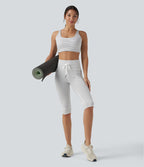 Legging 3/4 de yoga taille haute à rayures avec cordon de serrage et poches