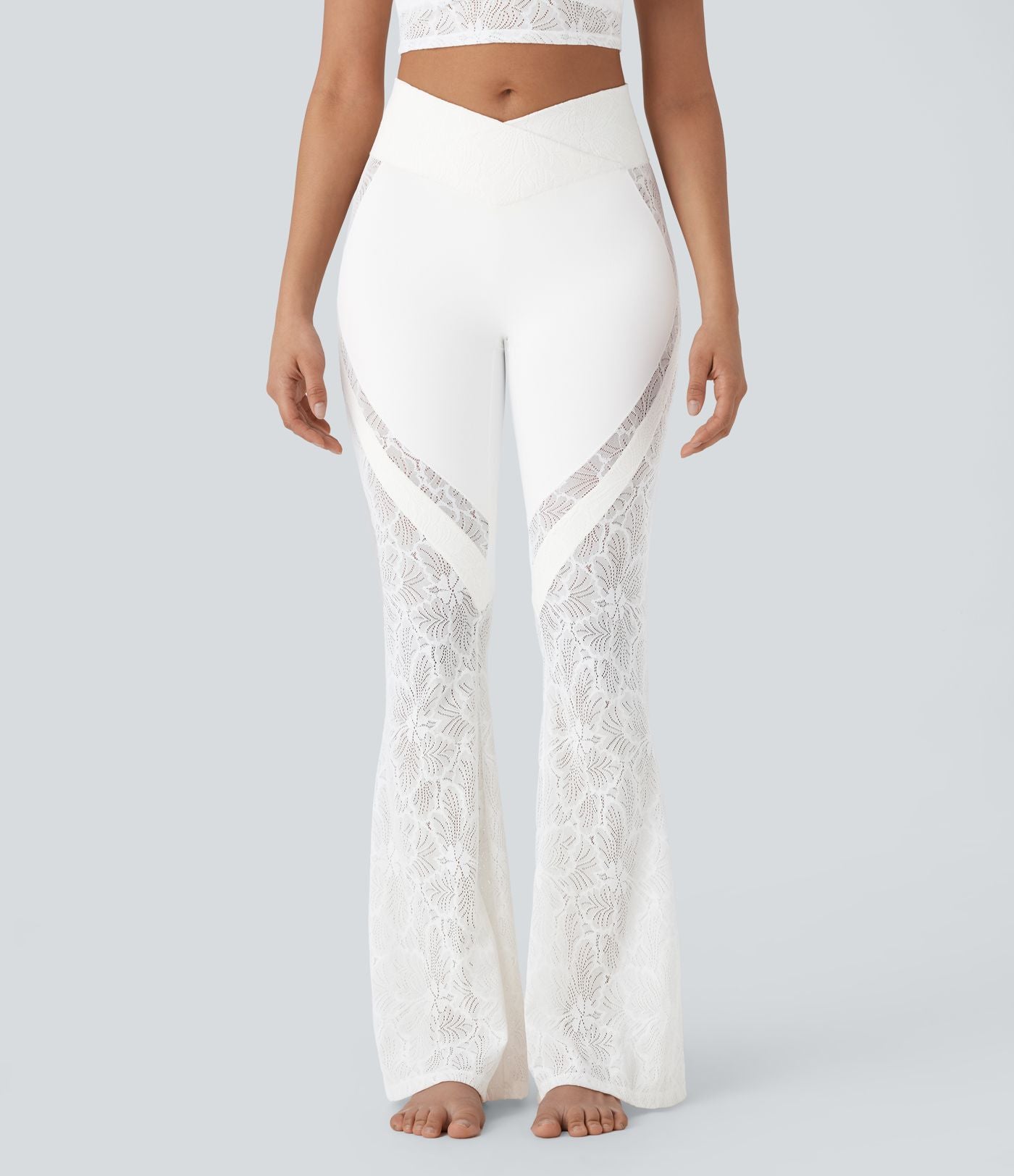 Pantalon de yoga évasé à taille haute croisée, poche arrière et dentelle