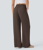 Pantalon large fluide taille haute avec cordon de serrage, poches latérales et aspect lin