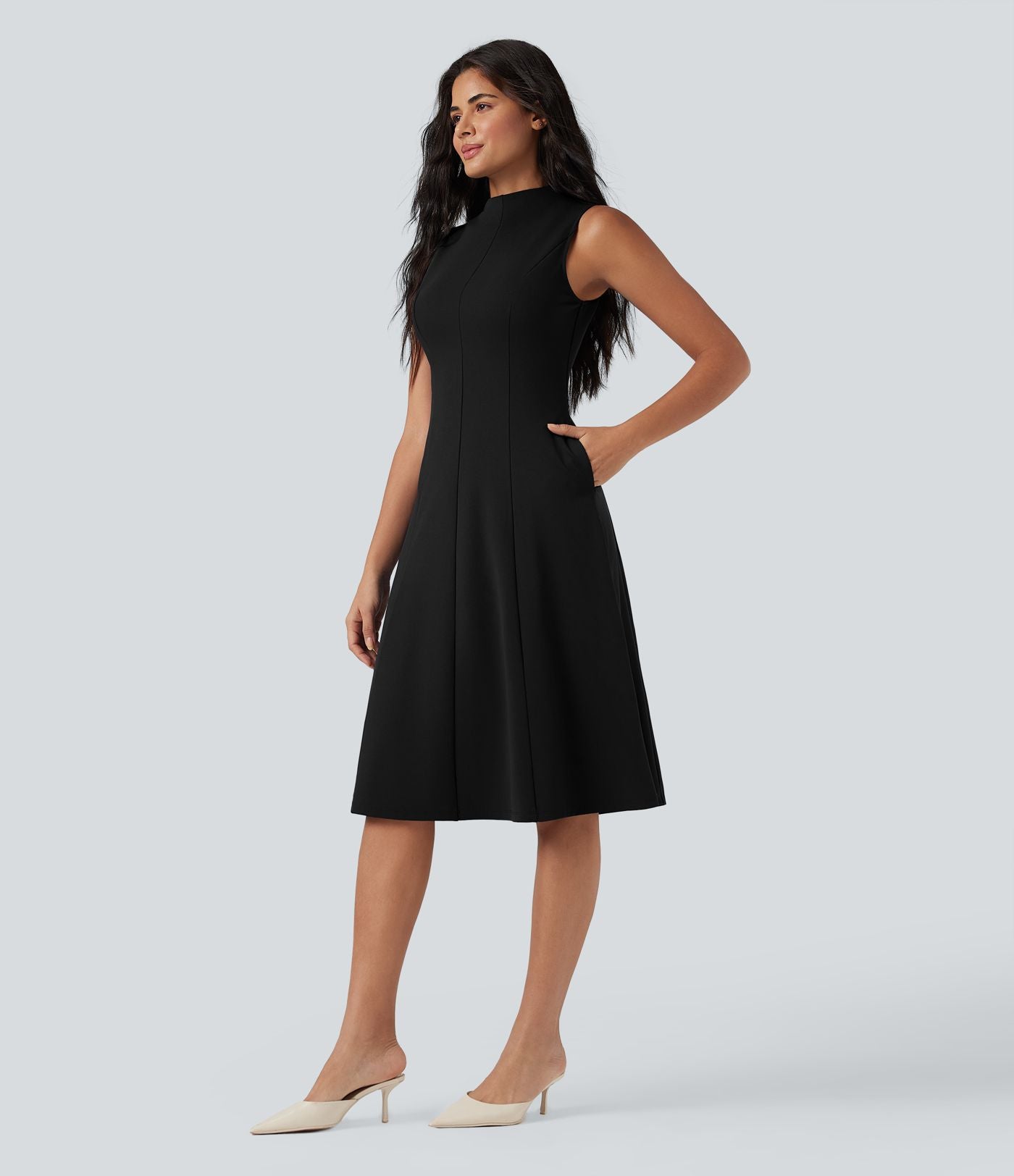 Robe mi-longue col montant sans manches avec poches