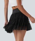 Jupe-short de tennis mini taille haute croisée fluide avec poches