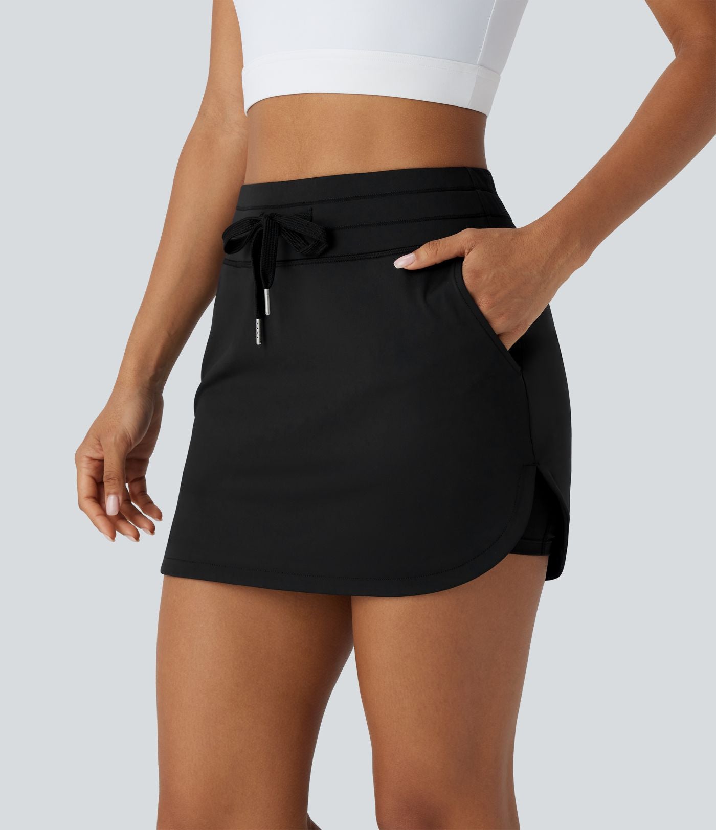 Softlyzero™ QuickDry Jupe de golf courte deux-en-un à taille haute avec poches latérales, ourlet arrondi, cordon de serrage - Poche pour tee de golf