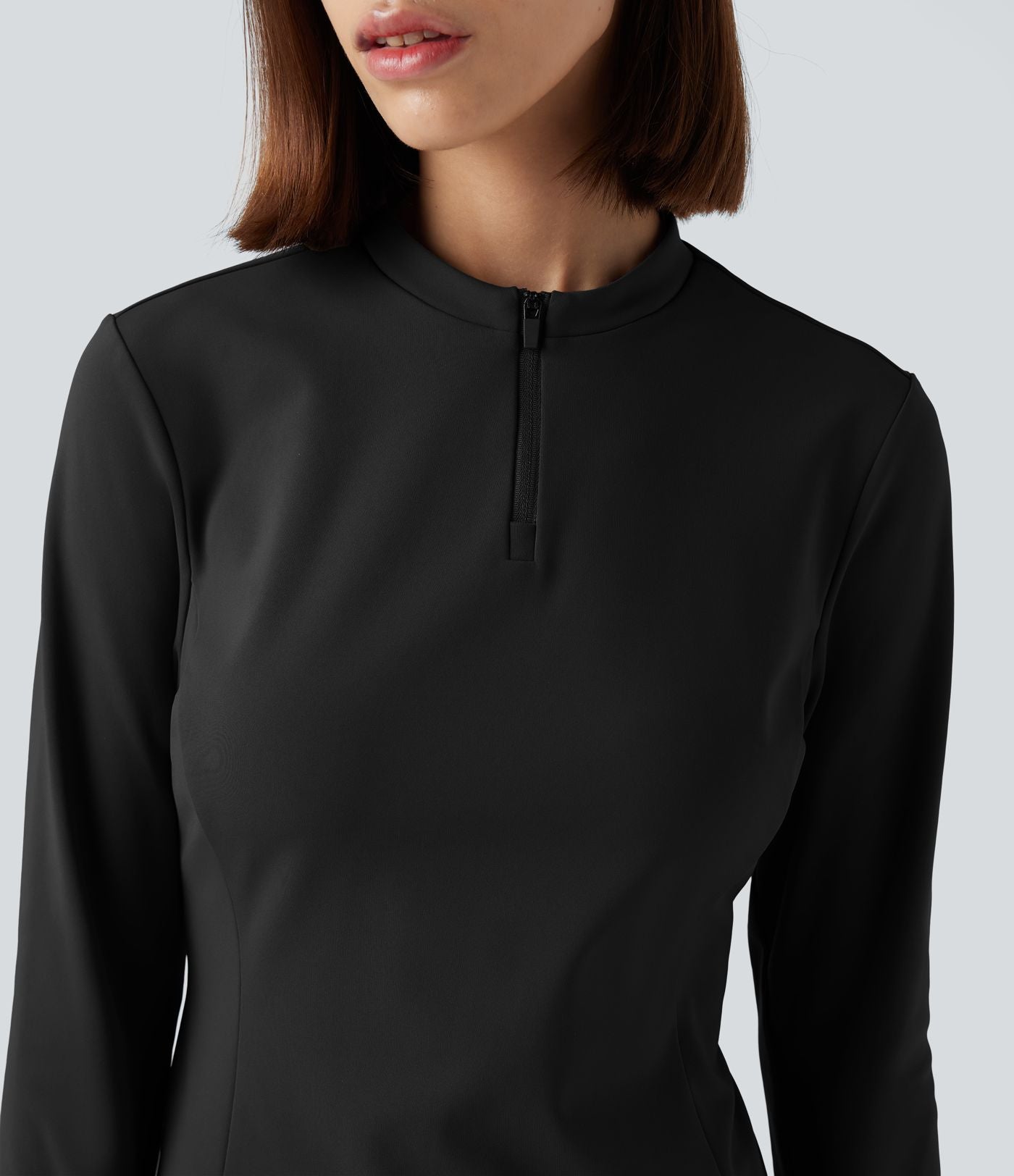 Haut de sport yoga polaire col montant demi-zip à manches longues avec passants pouces