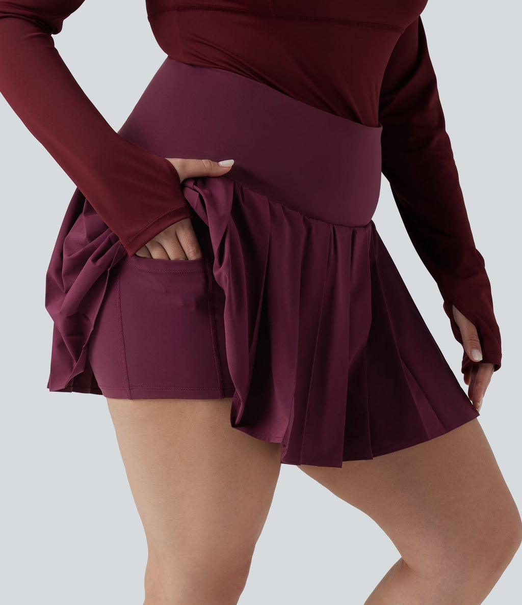 Breezeful™ Jupe-short yoga mini 2-en-1 grande taille à plis et ourlet asymétrique, taille haute, séchage rapide avec poches