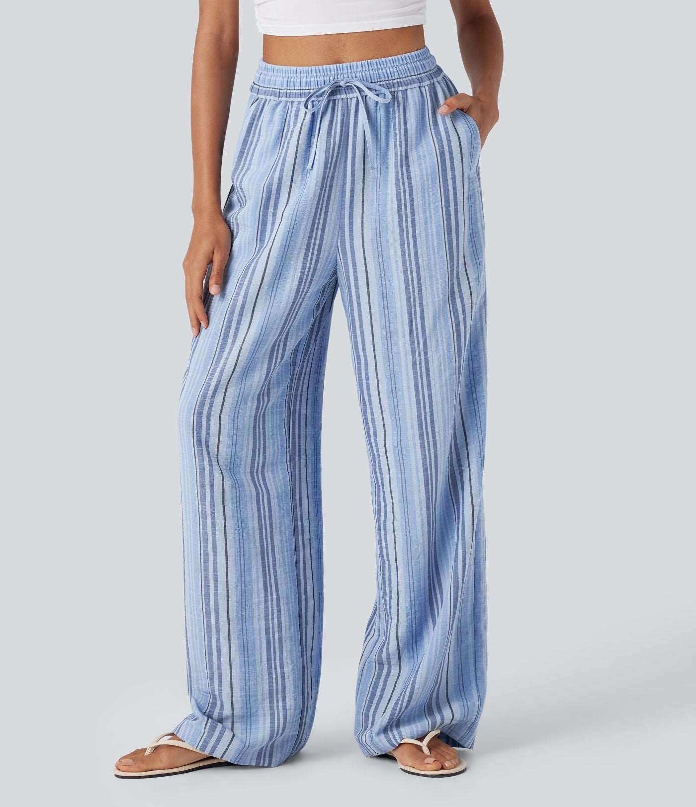 Pantalon large fluide taille haute avec cordon de serrage, rayures, aspect lin et poches latérales