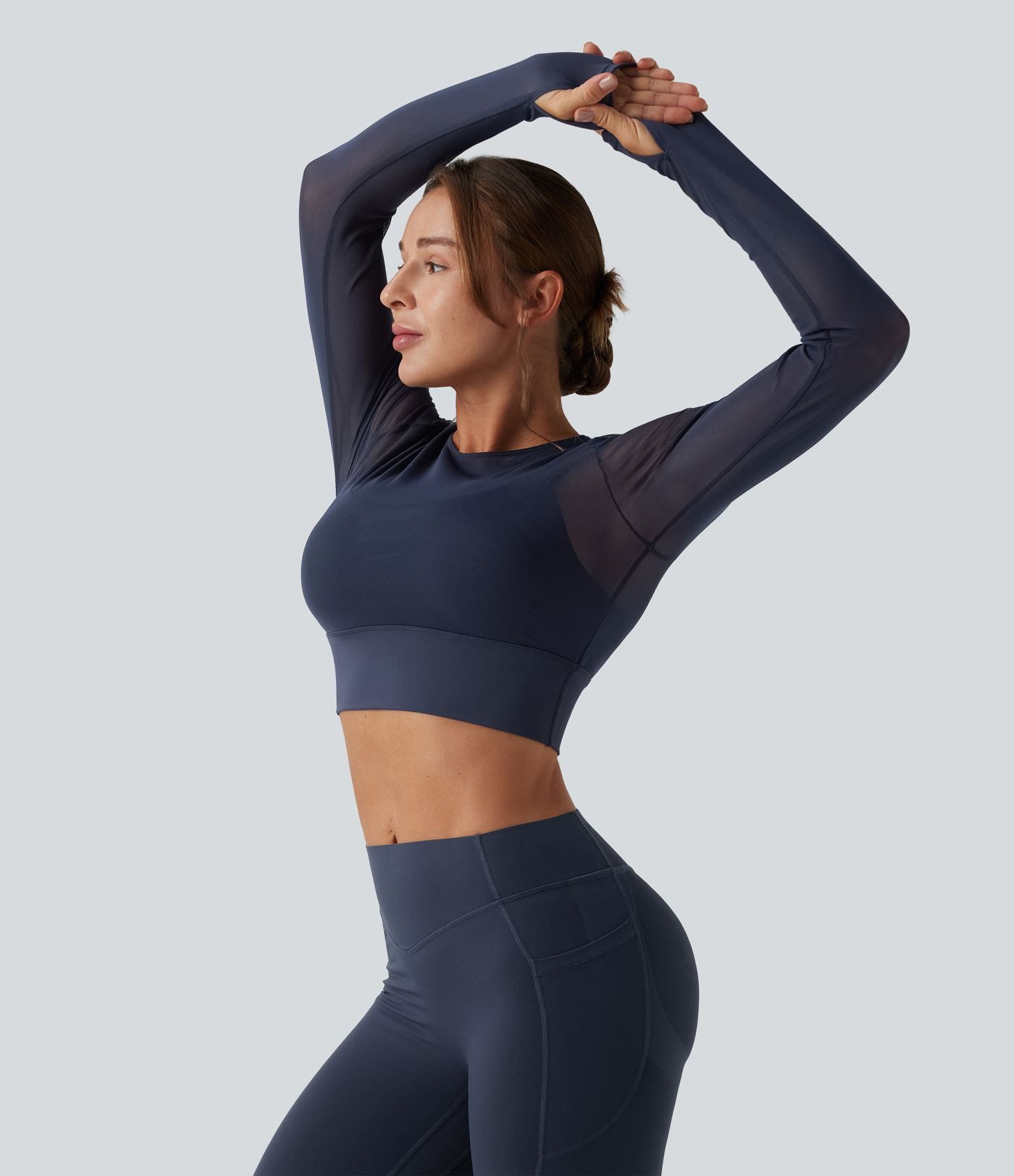 Haut de sport yoga cropped 2-en-1 manches longues mesh contrastant à trous pouces
