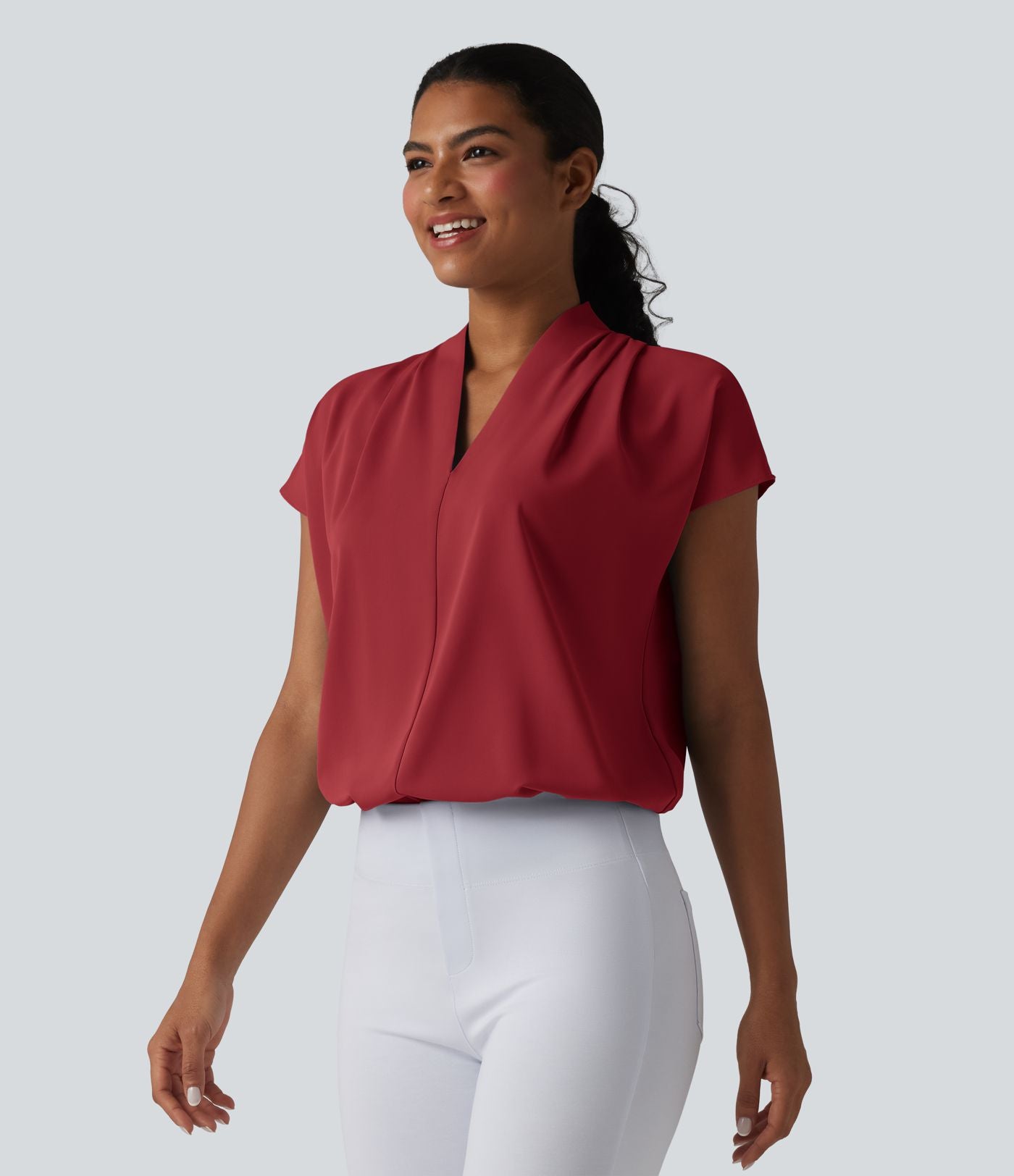 Blouse esprit bureau ample défroissage facile, col V et manches chauve-souris