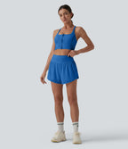 Short yoga 2-en-1 gainant taille haute à pois réfléchissants, ourlet arrondi croisé et œillets avec poches