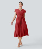 Robe midi Breezeful™ col V manches courtes à liens dans le dos séchage rapide avec poches latérales
