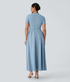 Robe longue décontractée à col montant, manches courtes et poches latérales