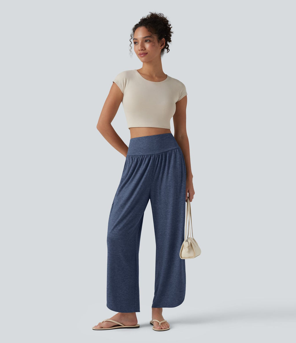 Pantalon décontracté taille haute gainant avec ourlet arrondi et poches