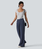 Pantalon tailleur évasé asymétrique taille mi-haute avec poches