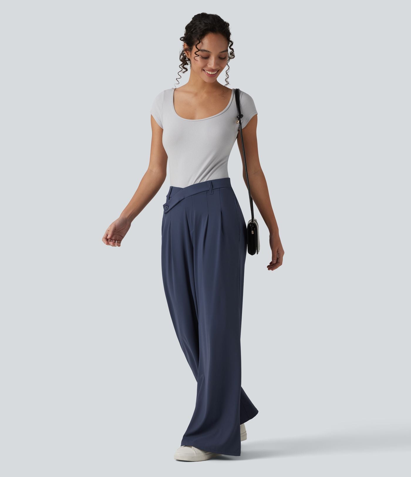 Pantalon tailleur évasé asymétrique taille mi-haute avec poches