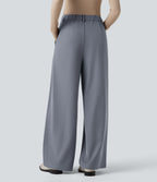 Pantalon tailleur large, taille haute, à poches