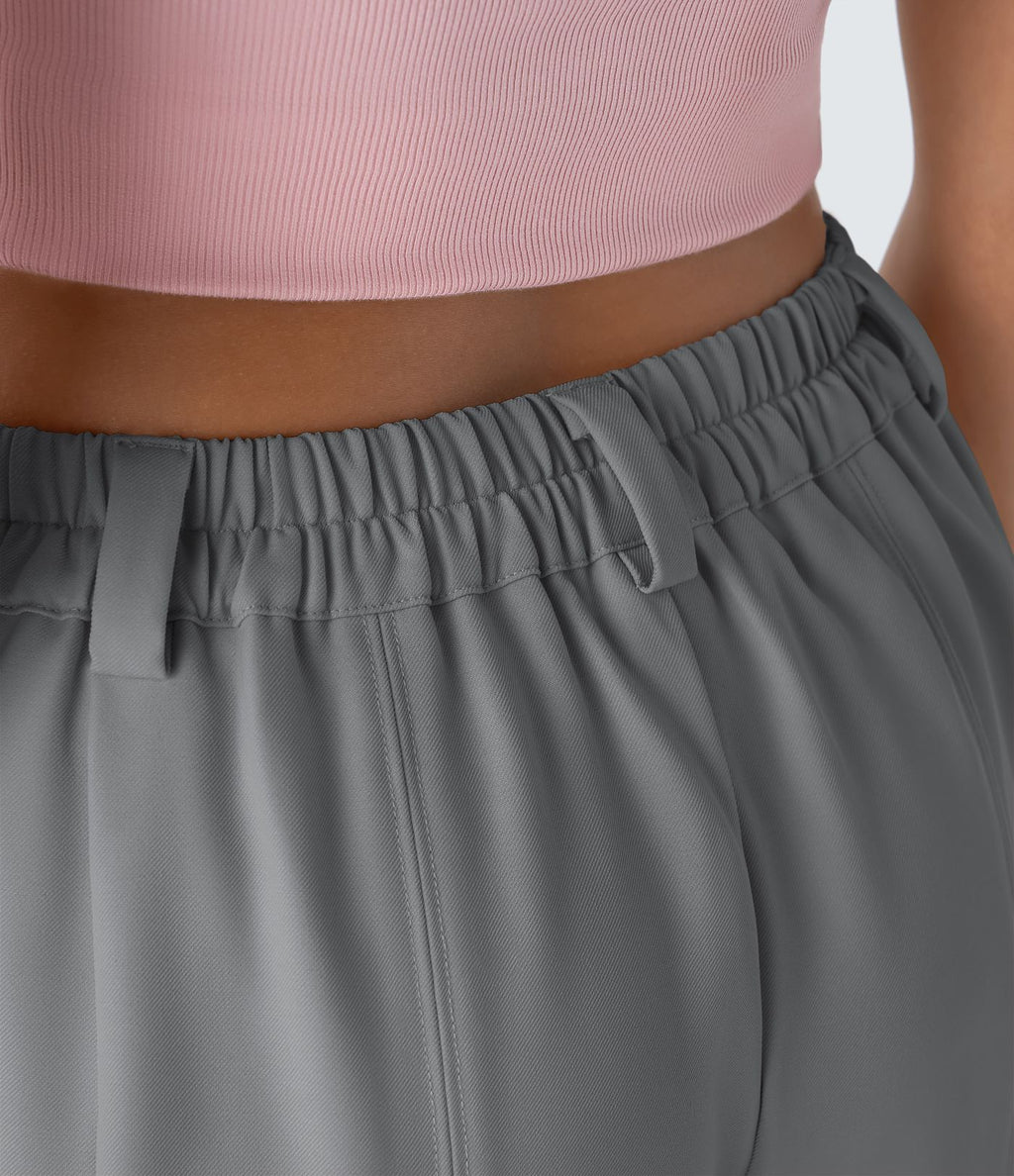 Pantalon tailleur ample, taille moyenne, coupe barrel, à poches