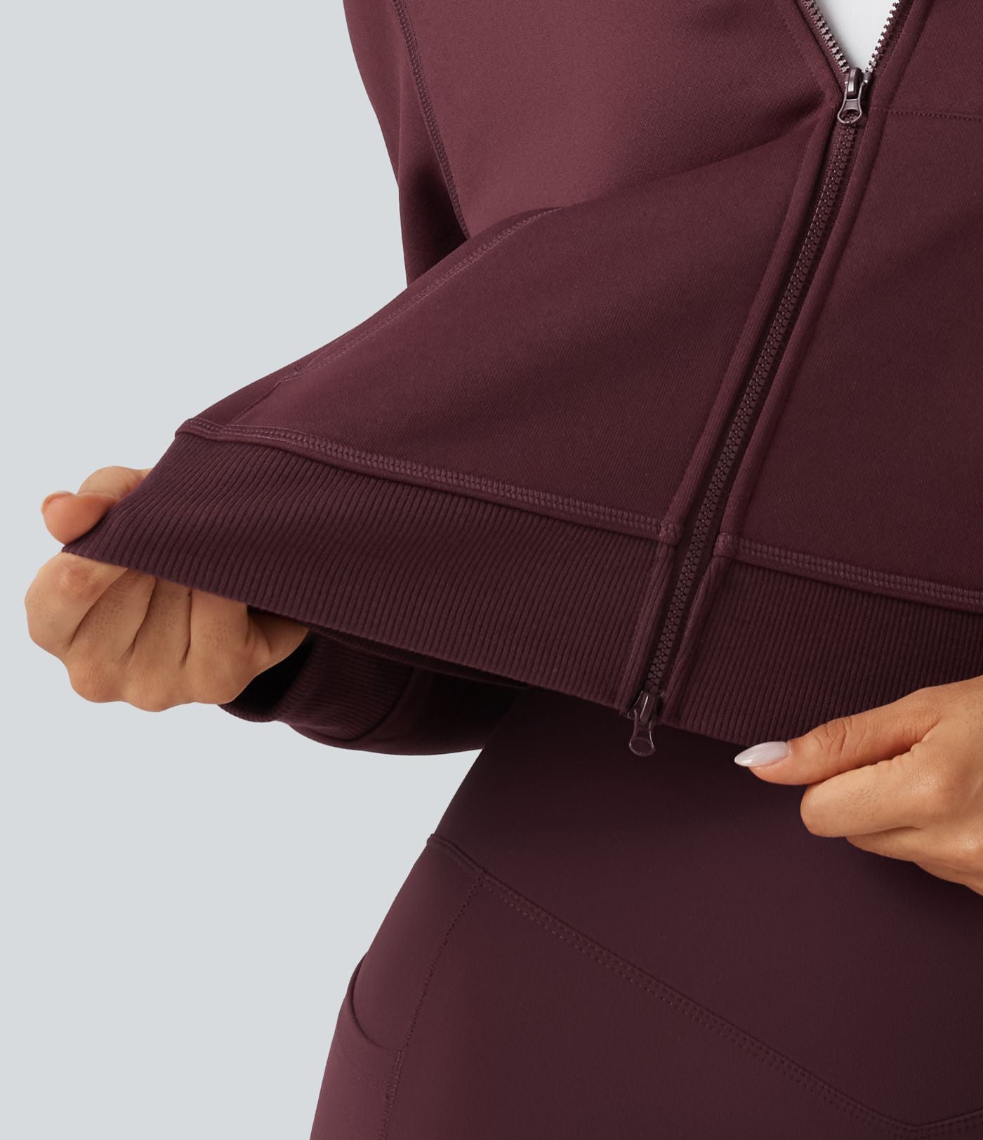 Veste de sport polaire à capuche, manches longues, zip et poches