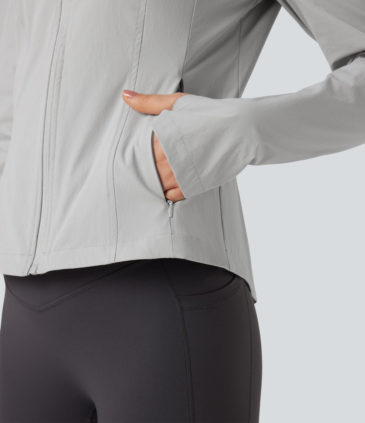 Veste de randonnée à capuche, manches longues, passants pouces et zip avec poches - UPF40+