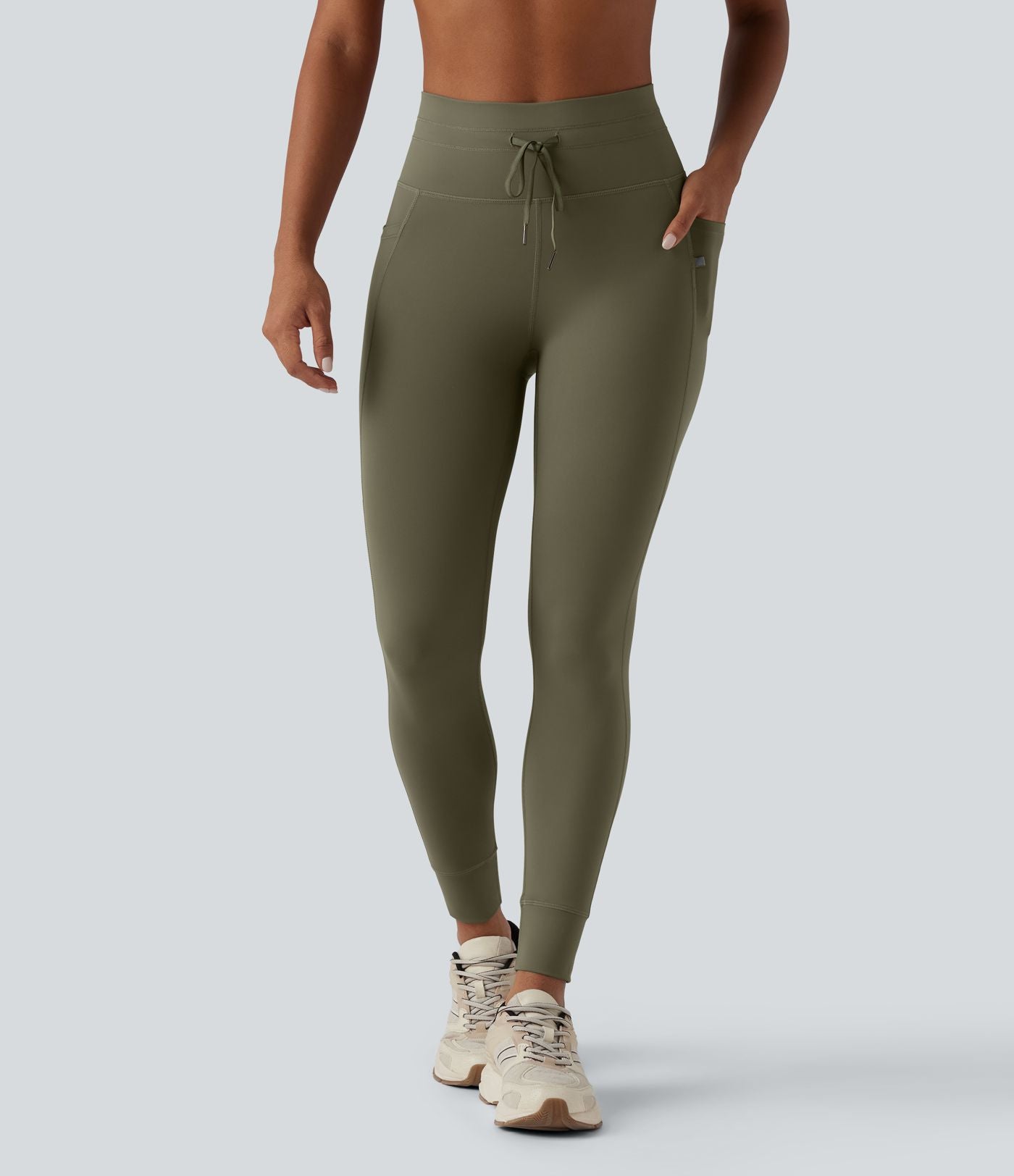 Legging 7/8 de yoga taille haute avec cordon de serrage uni et poches