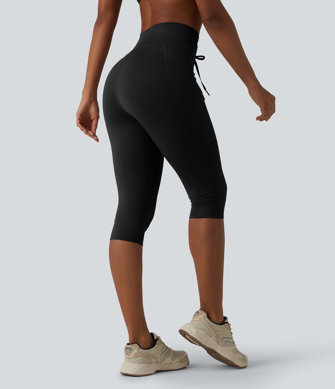 Legging yoga uni corsaire taille haute avec cordon de serrage et poches
