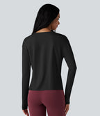 Top de sport running col rond fendu manches longues avec trous pouces