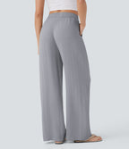 Pantalon large fluide taille haute avec cordon de serrage, poches latérales et aspect lin