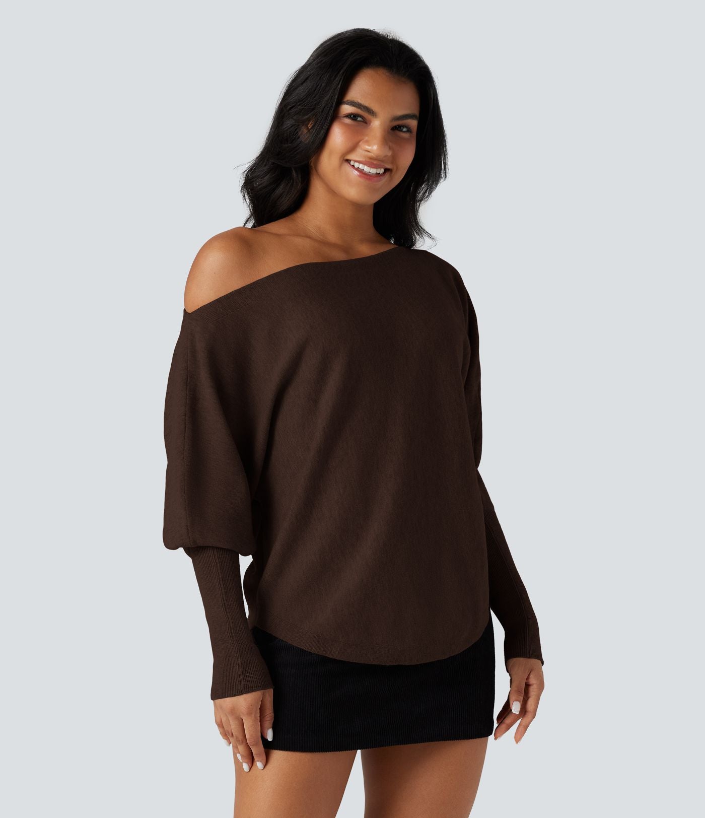 Pull une épaule manches chauve-souris ourlet arrondi