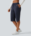 Pantacourt de golf taille mi-haute à séchage rapide avec cordon de serrage, ourlet arrondi, poches et protection solaire UPF40+
