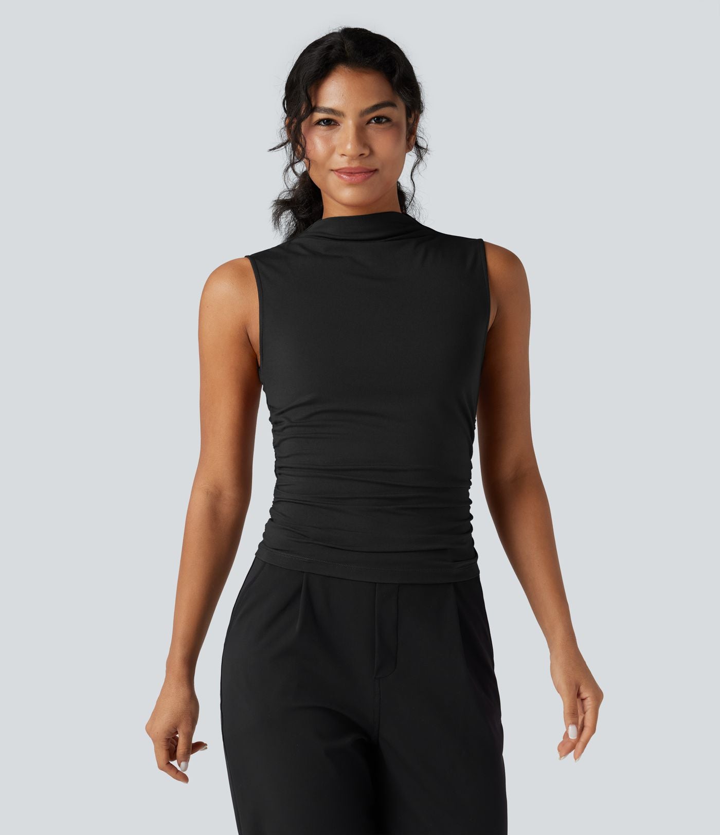 Top tailleur froncé col montant sans manches
