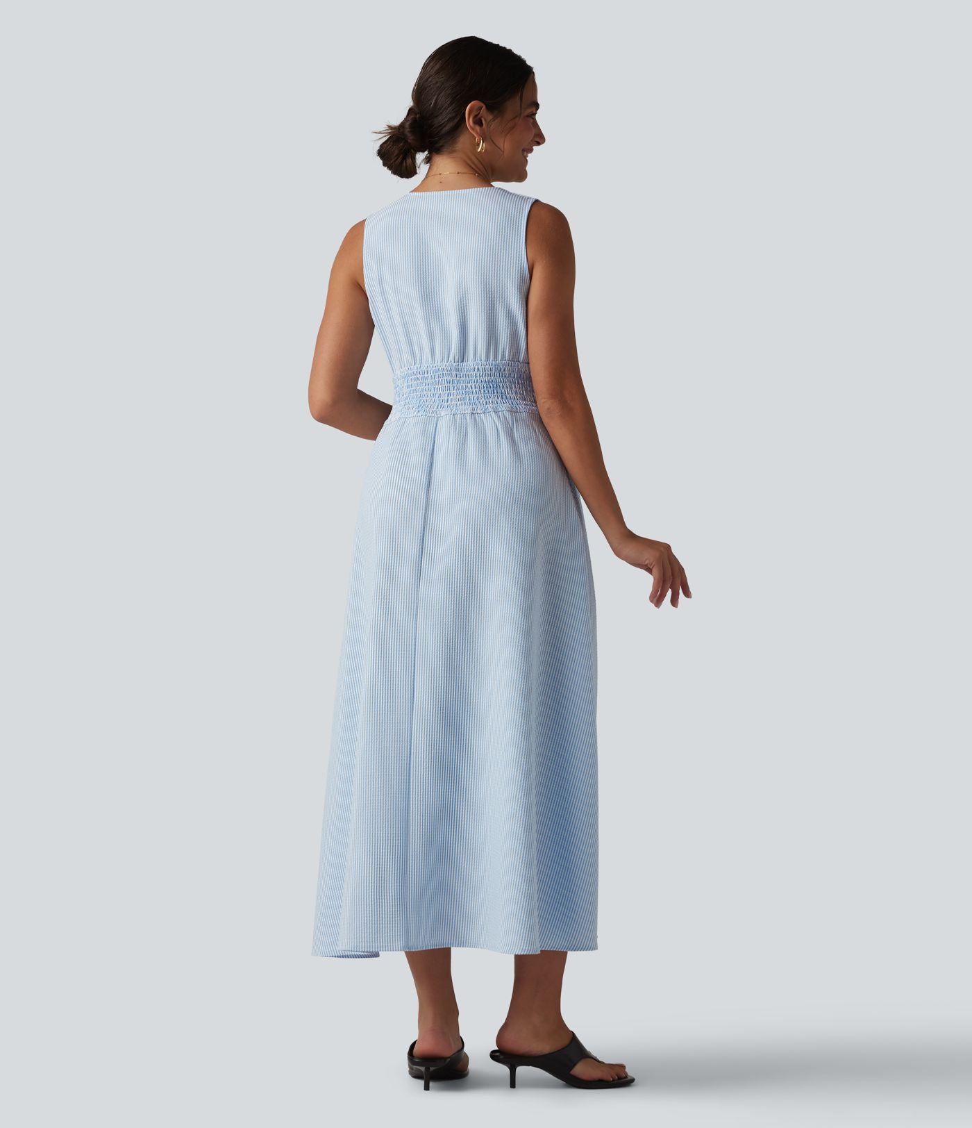 Robe midi rayée sans manches à col en V et poches