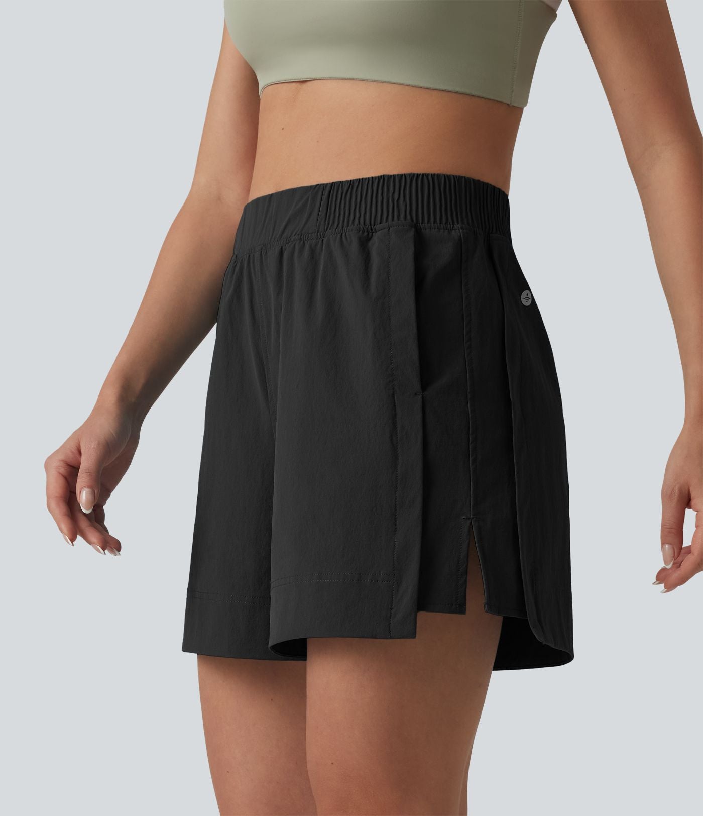 Short de tennis taille haute effet frais InstantCool avec fentes et poches, protection solaire UPF50+