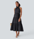 Robe mi-longue fluide de vacances à pois avec col licou, découpe dos, ceinture et poches latérales