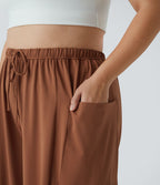 Pantalon Large Casual Taille Mi-Haute Taille Élastique Cordon Poches Latérales Ourlet Flottant Grande Taille