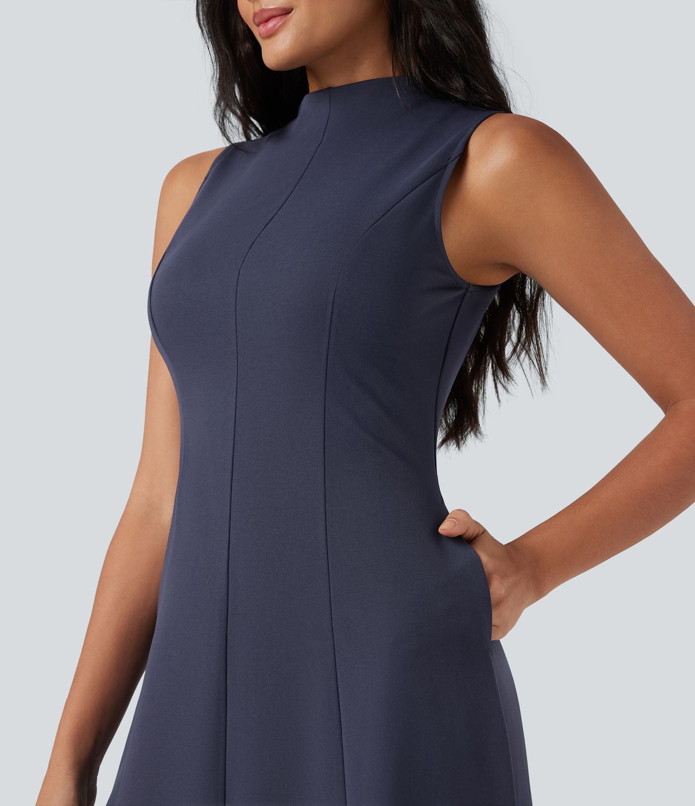 Robe mi-longue col montant sans manches avec poches