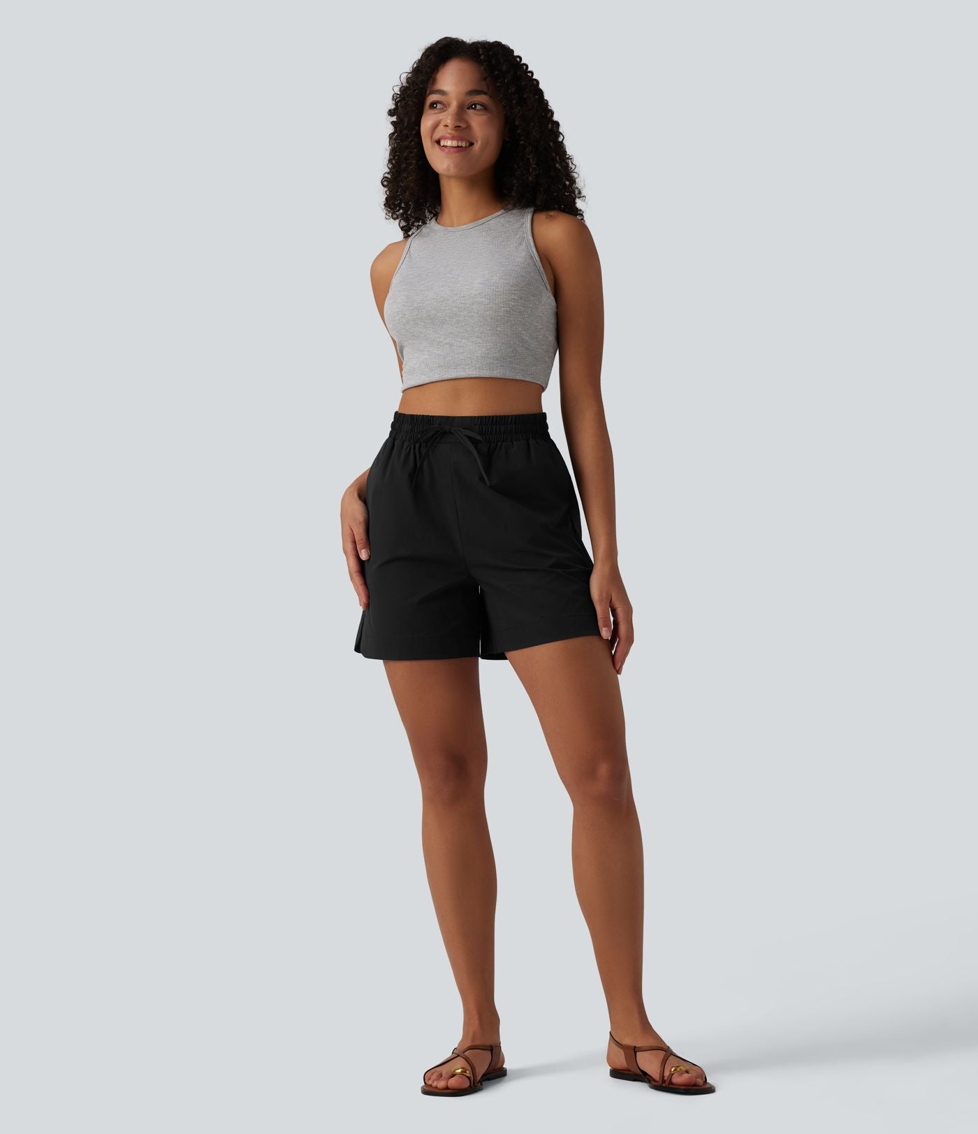 Short ample décontracté taille haute avec cordon de serrage ourlet arrondi avec poches