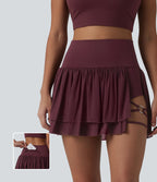 Jupe de danse mini 2-en-1 en mesh respirant à volants et ourlet asymétrique taille haute avec poches