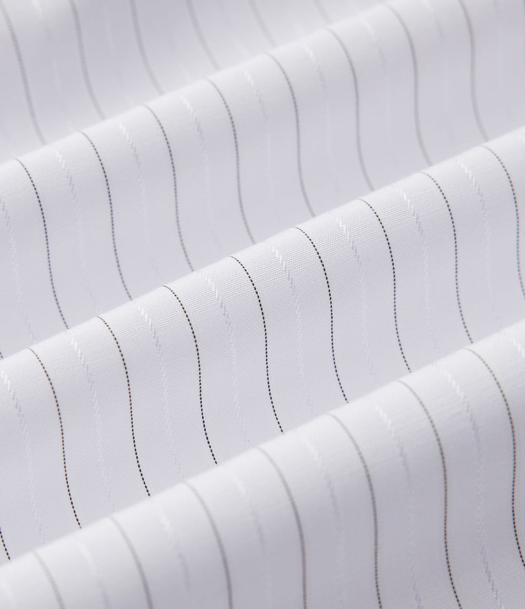 Chemise casual col manches retroussées torsadée asymétrique à rayures