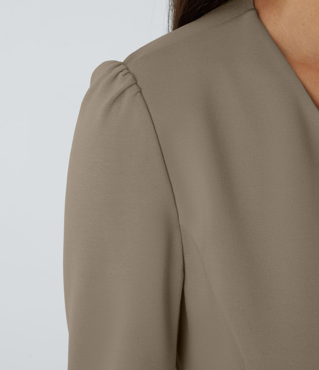 Blazer tailleur ajusté à col rond, manches longues avec boutons décoratifs