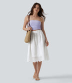 Jupe évasée plage broderie anglaise taille haute