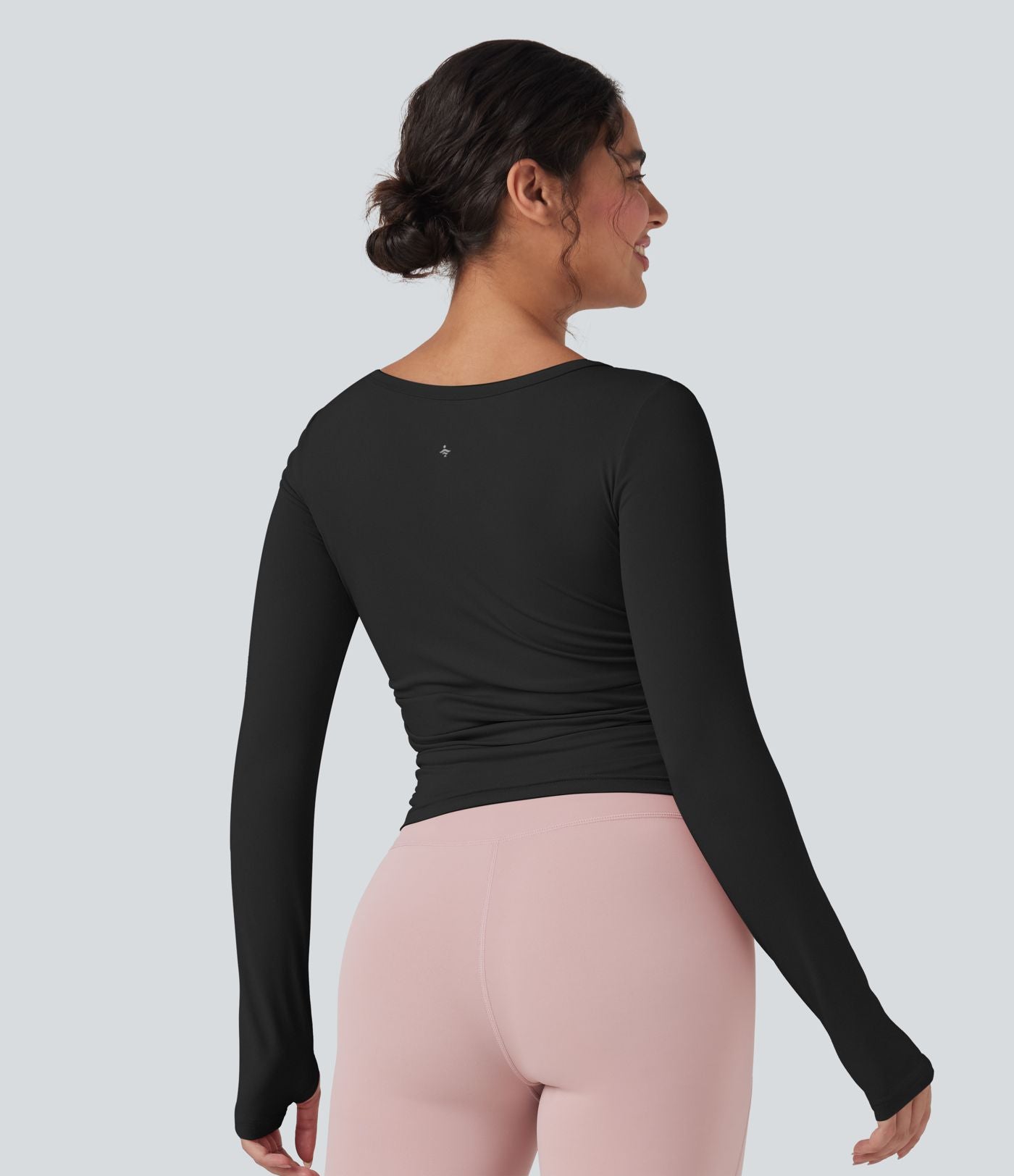 Haut de sport yoga col rond manches longues à trous pouces froncé