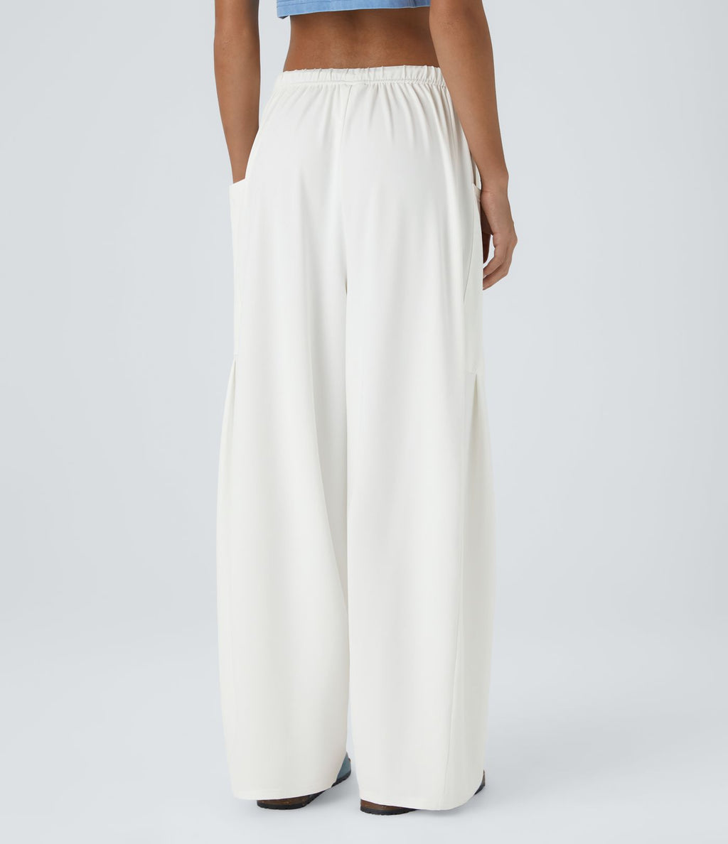 Pantalon Large Fluide Taille Mi-Haute Taille Élastique Cordon Poches Latérales Ourlet Flottant