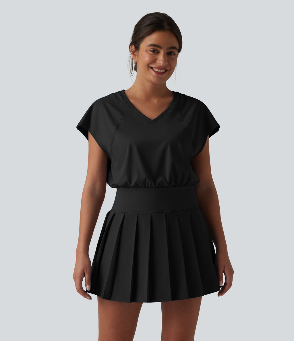Robe sport de tennis mini 2-en-1 à col V, manches courtes et ourlet plissé avec fermeture éclair invisible et poches
