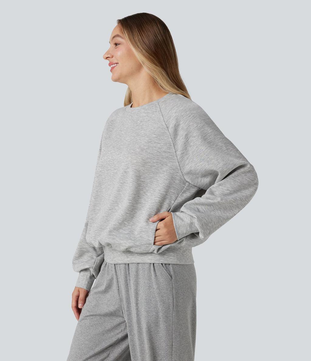 Sweat-shirt col rond manches longues à découpes avec poches